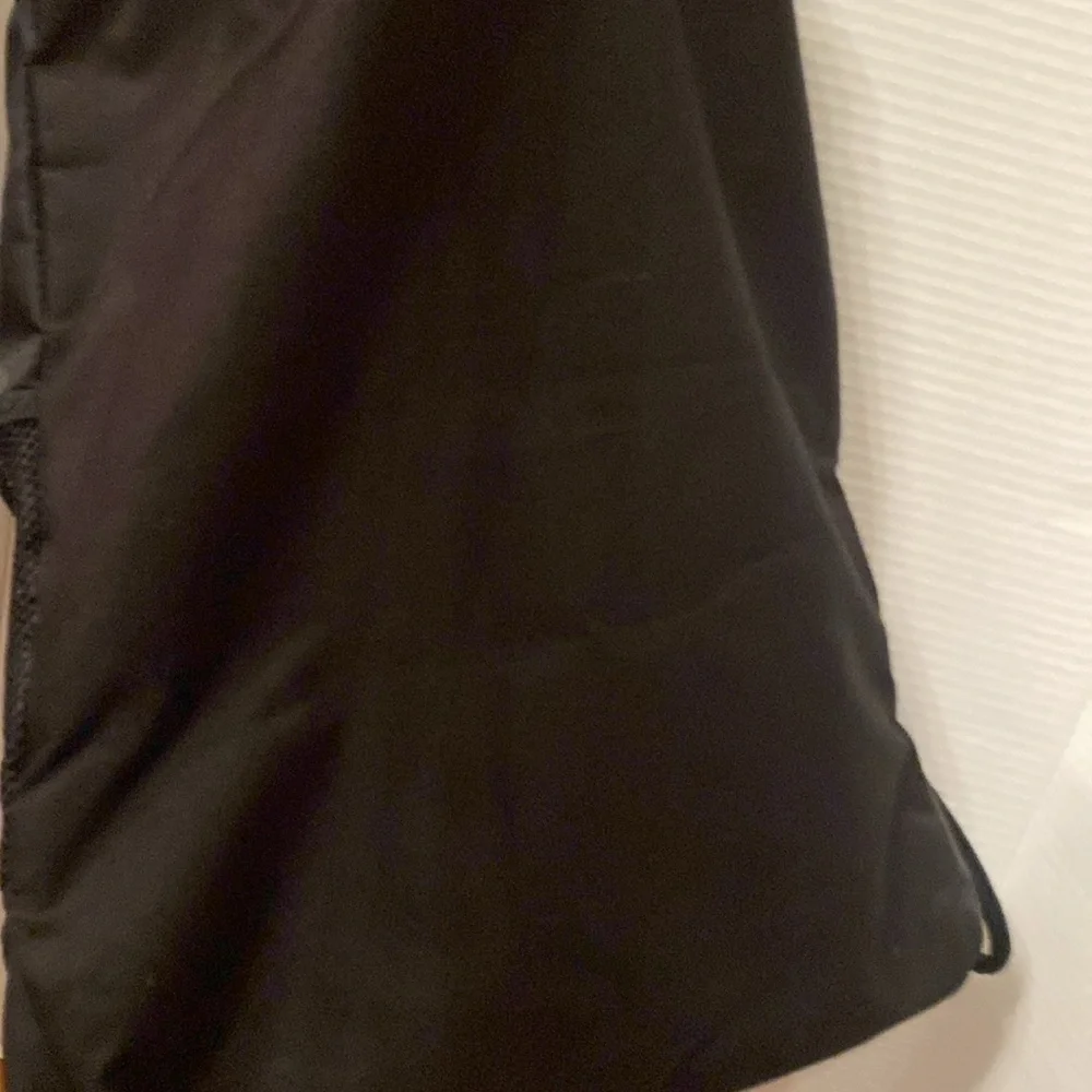 Adidas  black w/ 3 gray stripe polyester Drawstring Backpack front zip pocket